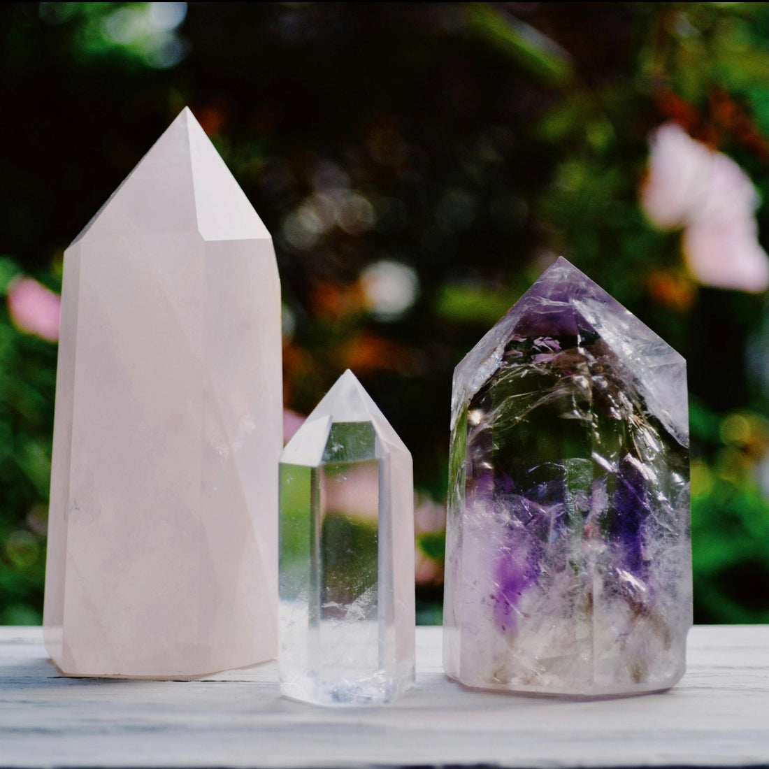 Three tower crystals to represent the blog about gemstones and their properties.