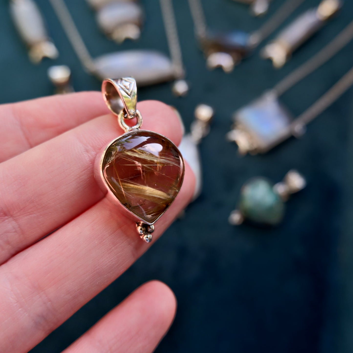 The Gold Rutilated Quartz Pendant